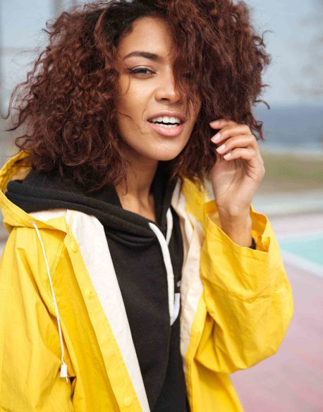 amazing-african-curly-young-woman-wearing-yellow-PCUMRSX-unsplash-scaled.jpg
